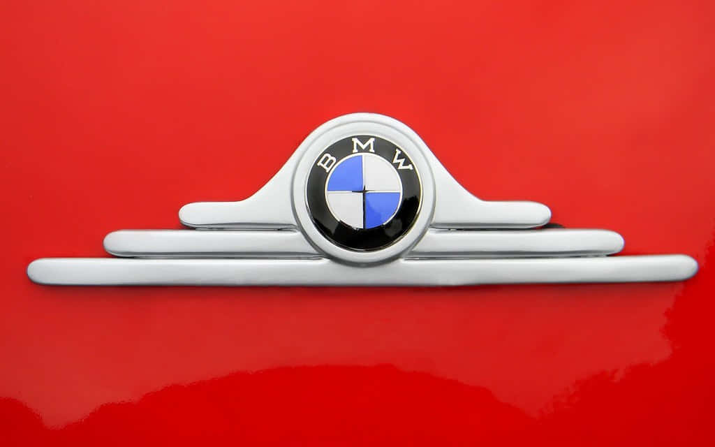 Prestigious Bmw Emblem On A Shining Black Surface Wallpaper