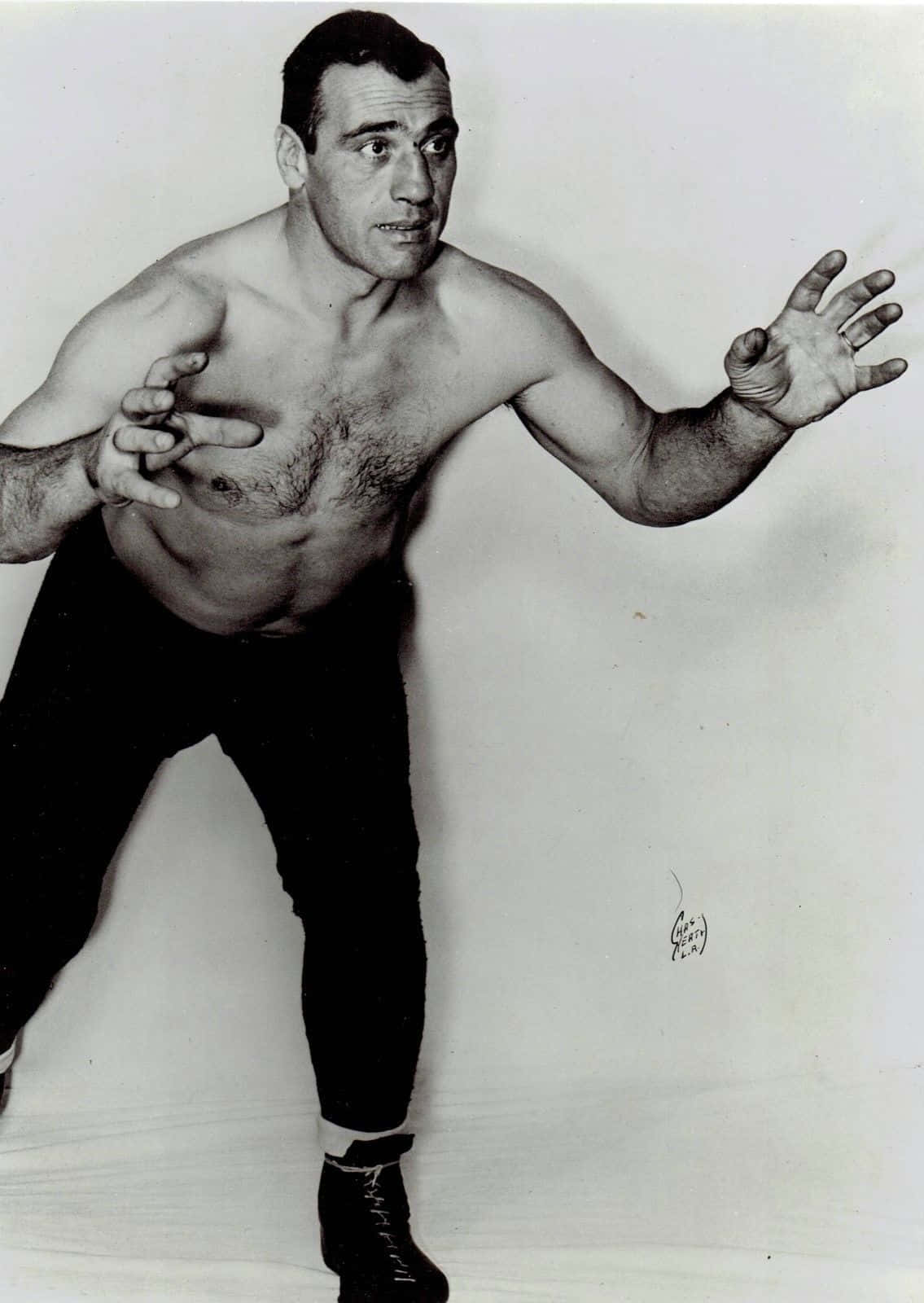 Primo Carnera - The Italian Boxing Legend On A West Coast Wrestling Card Wallpaper