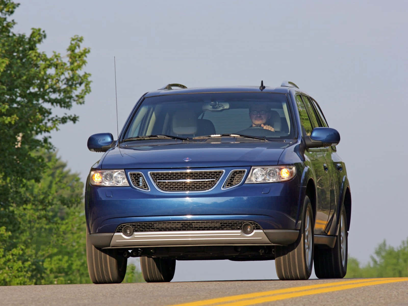 Pristine Saab 9-7x On An Open Road Wallpaper