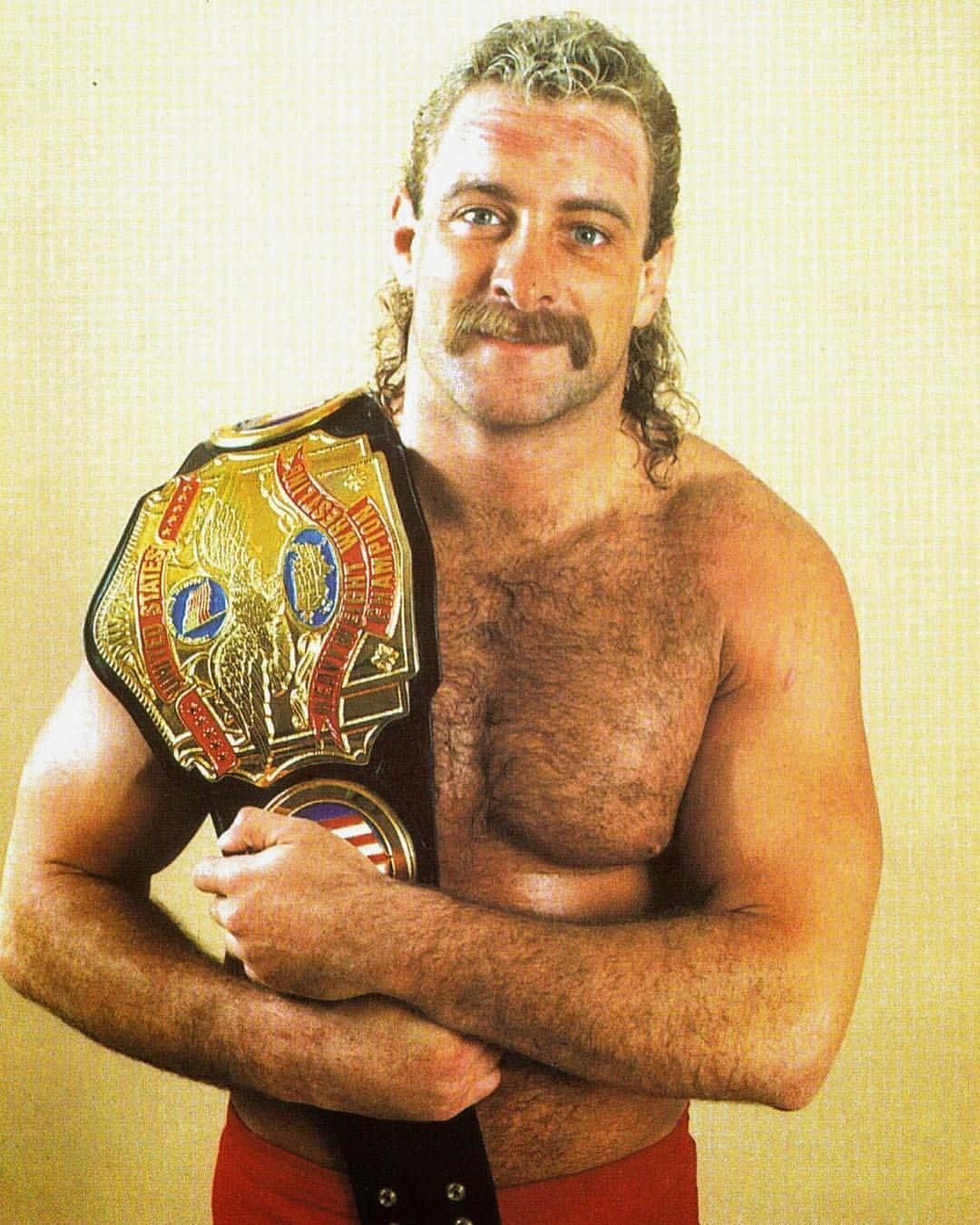 Pro Wrestler Magnum Ta With World Heavyweight Championship Belt Wallpaper