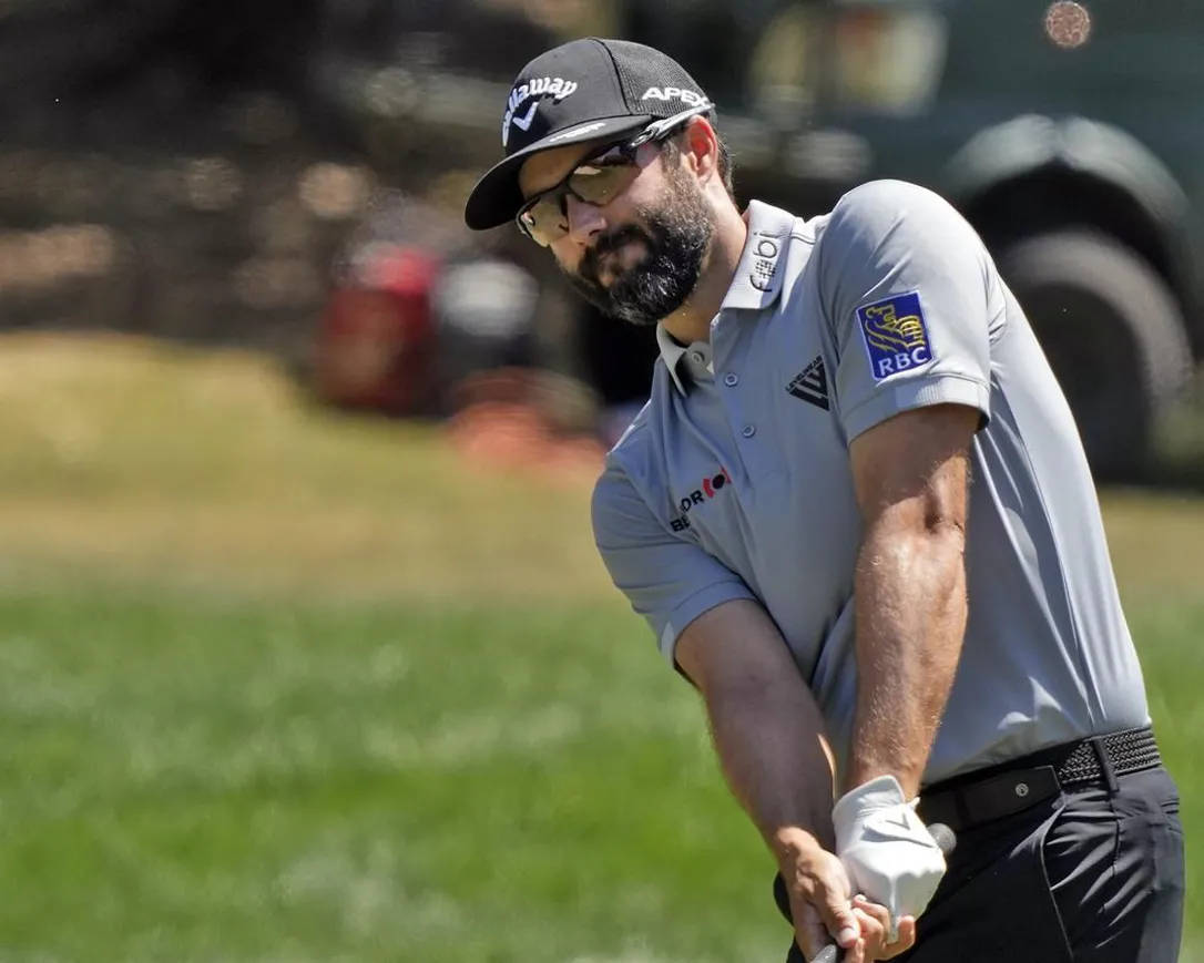 Professional Golfer Adam Hadwin In Action Wallpaper