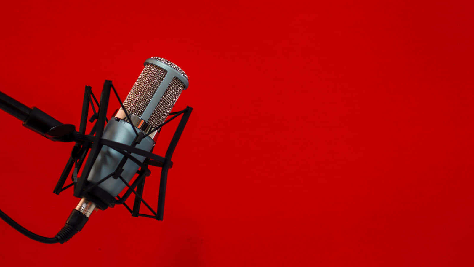 Professional Podcast Microphone Red Background Wallpaper