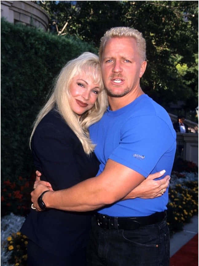 Professional Wrestler Jeff Jarrett With Karen Jarrett At A Wwe Event Wallpaper