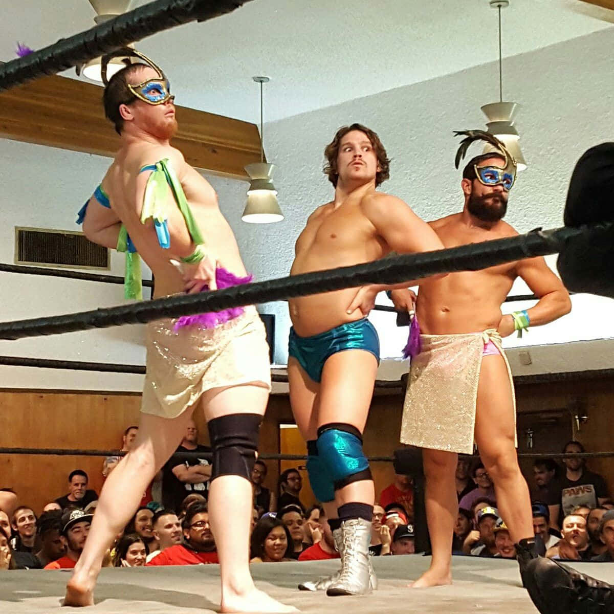 Professional Wrestlers Kyle O’reilly And Bobby Fish With Dalton Castle Wallpaper