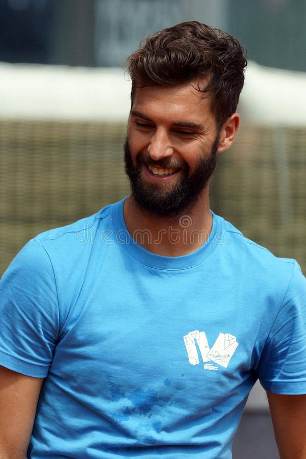 Prolific Tennis Player, Benoit Paire Flashes A Smiling Profile Wallpaper