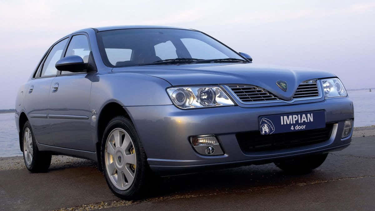 Proton_ Impian_ Sedan_by_the_ Waterfront Wallpaper