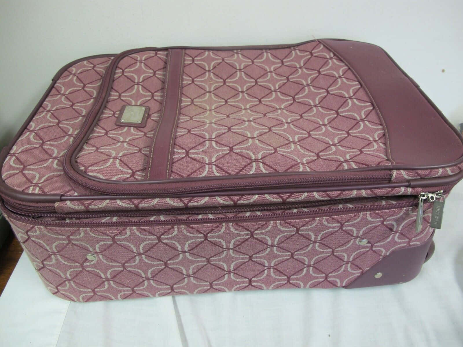 Purple Patterned Suitcase Wallpaper