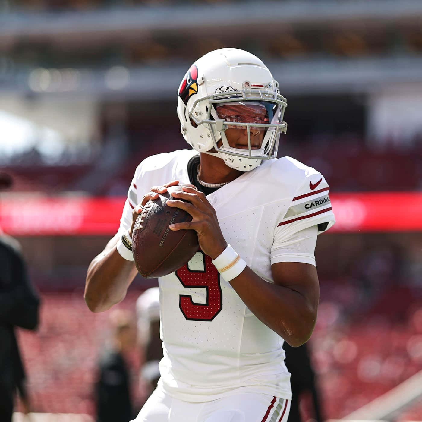 Quarterback Ready To Throw Football Wallpaper