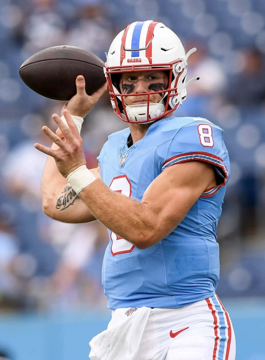 Quarterback Will Levis Preparingto Throw Football Wallpaper