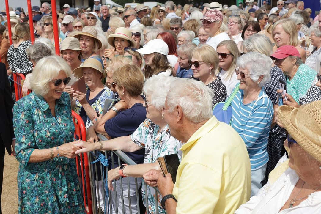 Queen Camilla Shaking Hands Wallpaper