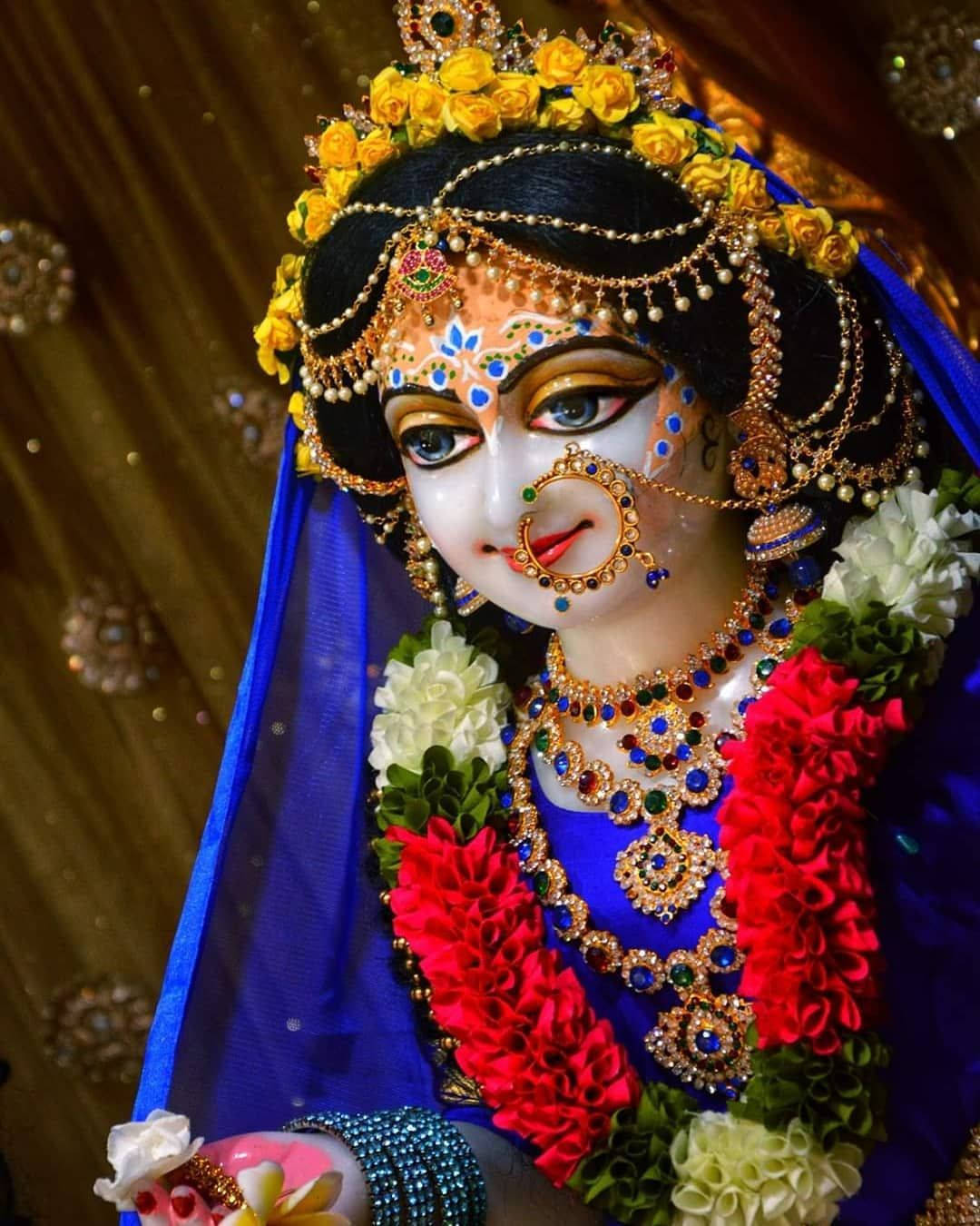 Radha Rani Sculpture As An Iskcon Tribute Wallpaper