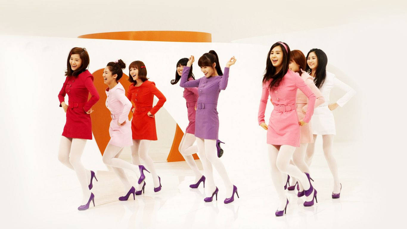 Radiant Ladies Of Girls' Generation In Vibrant Dresses. Wallpaper