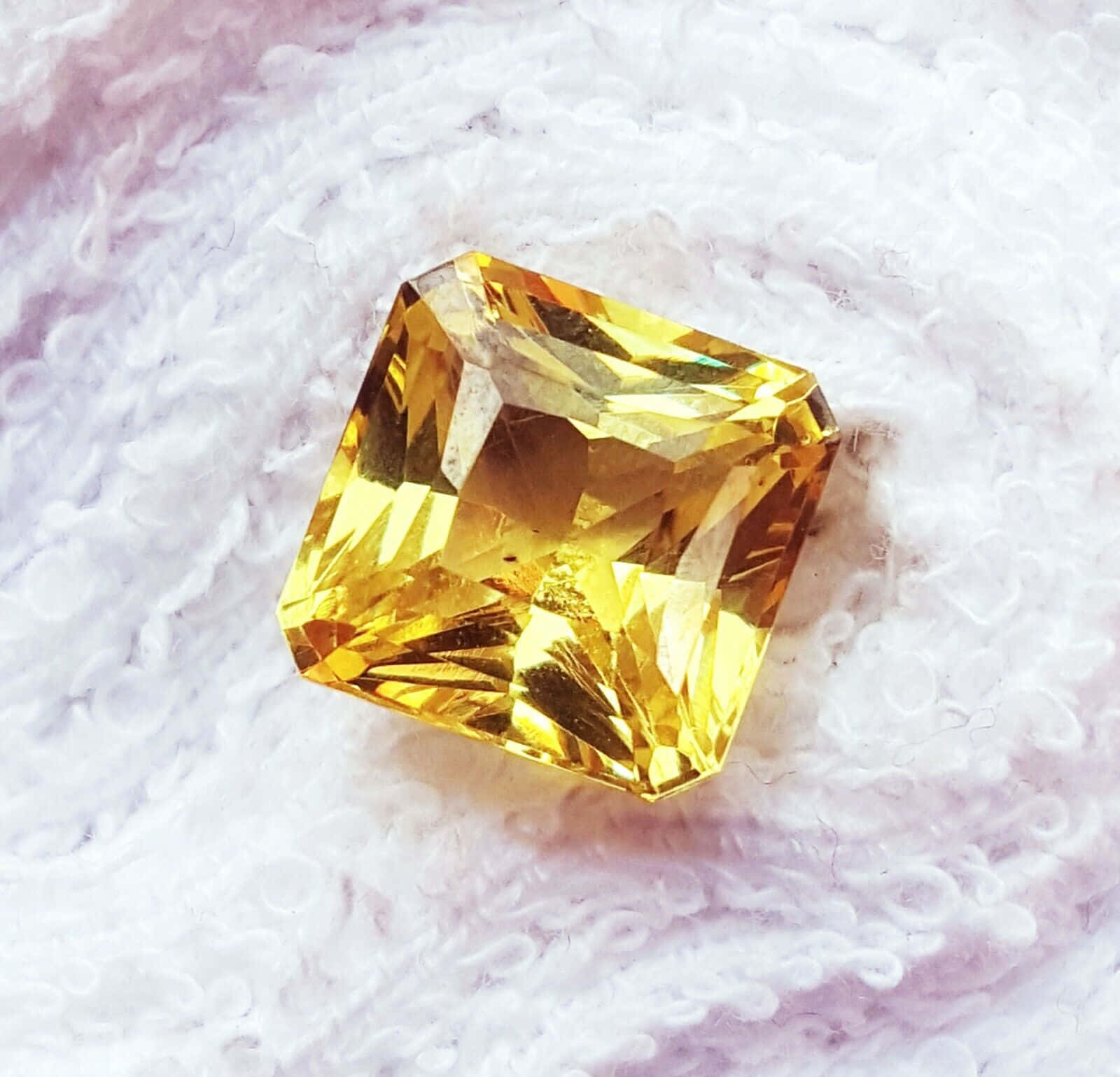 Radiant Yellow Sapphire Gemstone Wallpaper