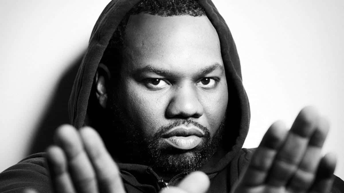 Raekwon Hooded Glance Blackand White Wallpaper