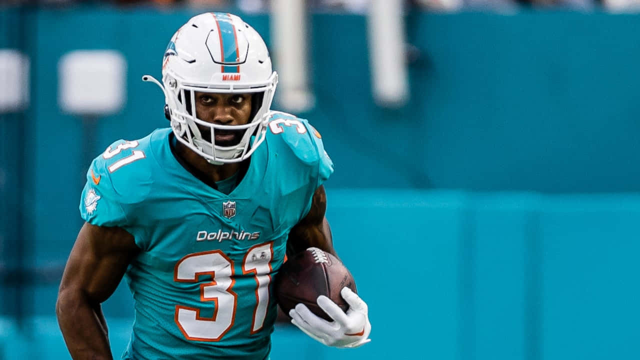 Raheem Mostert Miami Dolphins Running Back Action Wallpaper