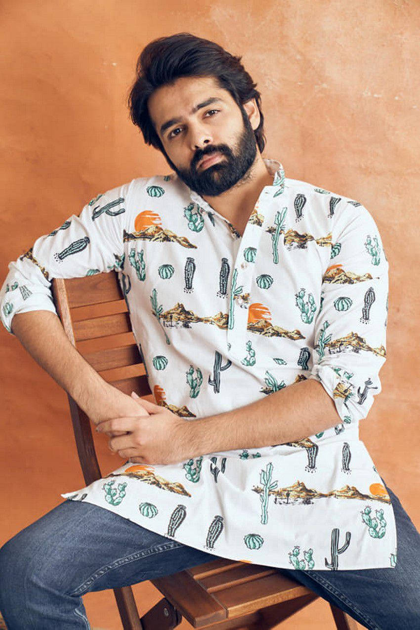 Ram Pothineni On Wooden Chair Wallpaper