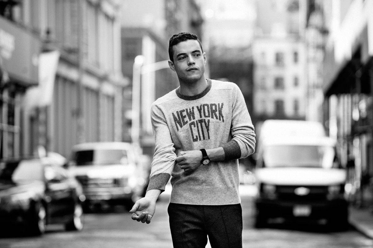 Rami Malek Standing In The Street Wallpaper