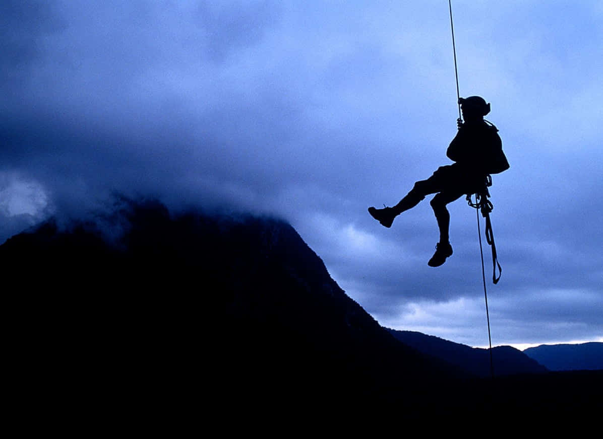 Rappelling Adventure Silhouette Wallpaper