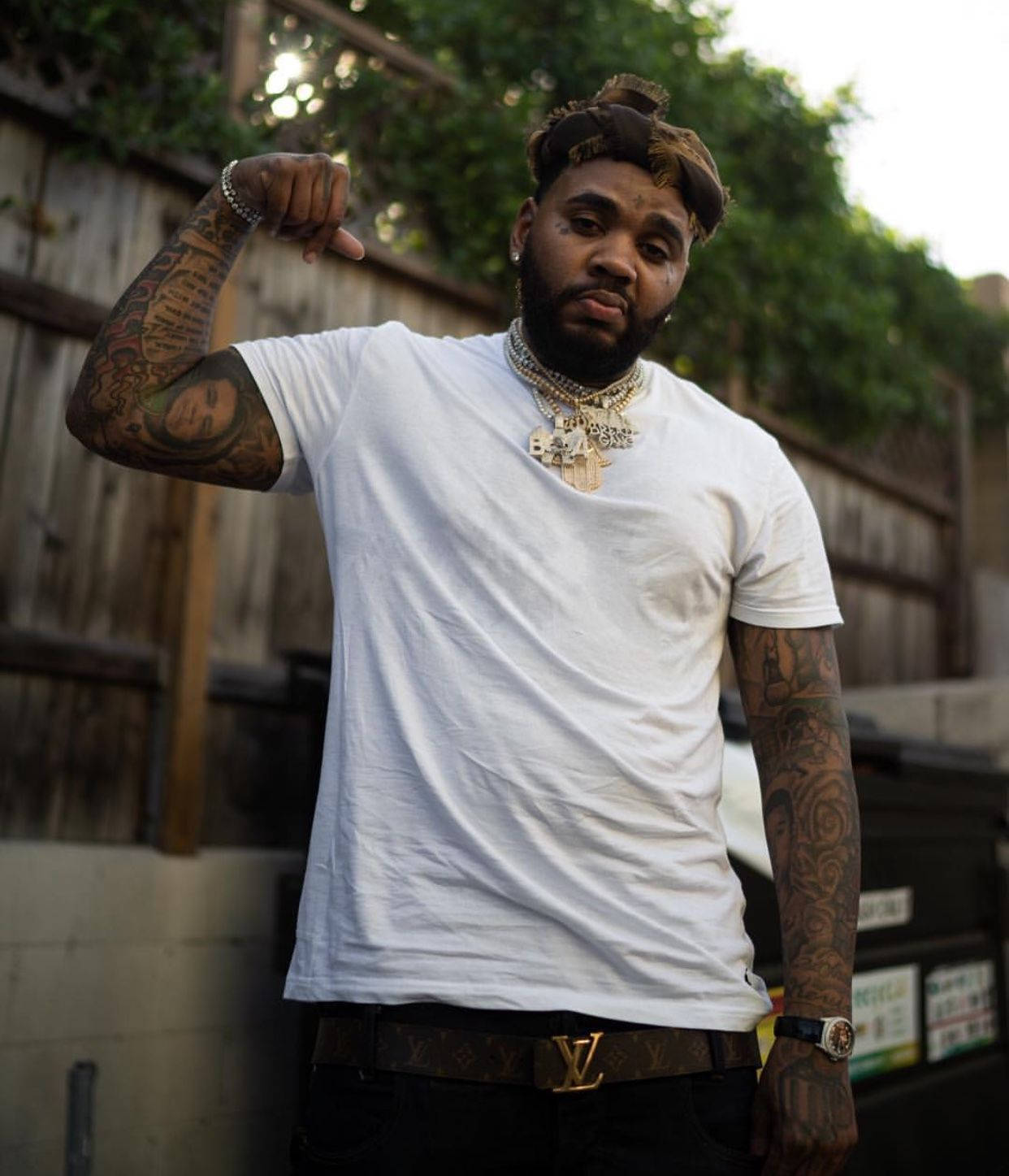 Rapper Kevin Gates Performing Onstage Wallpaper