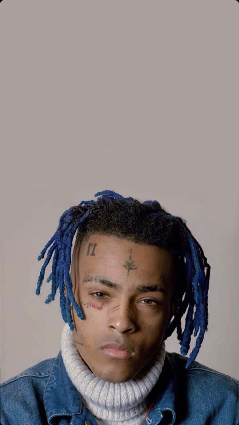 Rapper Xxxtentacion With Blue Hair. Wallpaper