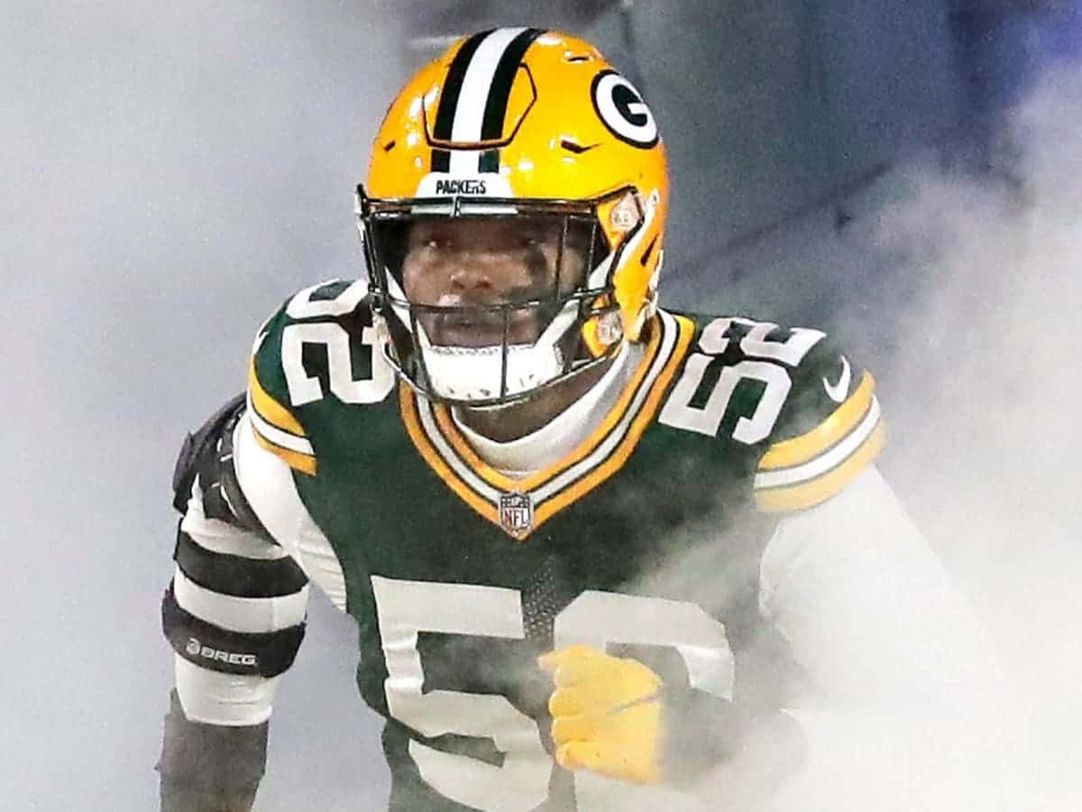 Rashan Gary Green Bay Packers Focused Entrance Wallpaper