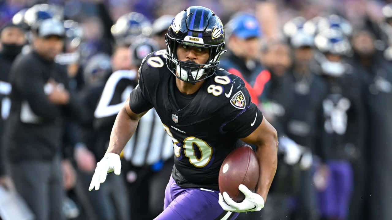 Ravens_ Player_ In_ Action.jpg Wallpaper