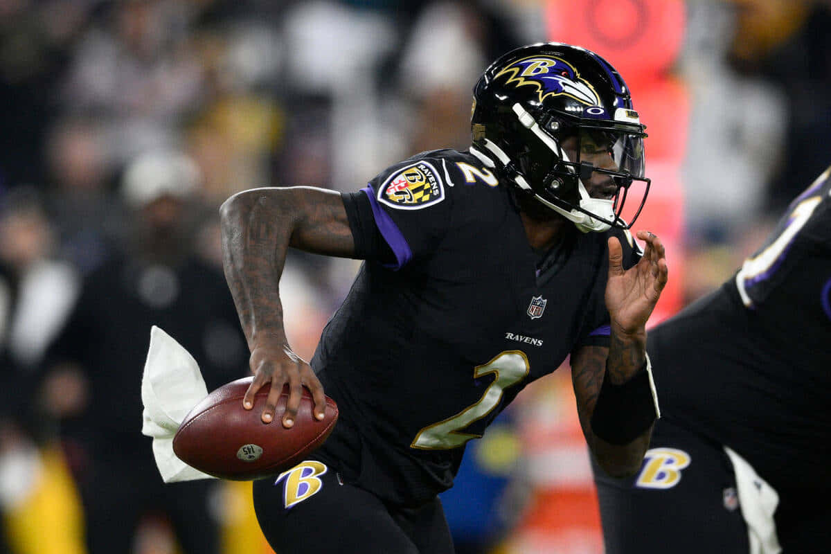 Ravens_ Quarterback_ In_ Action.jpg Wallpaper