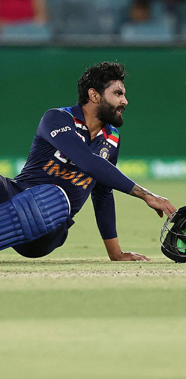 Ravindra Jadeja Sitting On The Ground Wallpaper