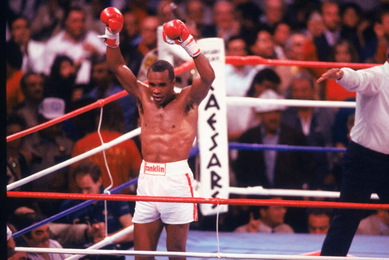 Ray Leonard Cheering And Raising His Fists Wallpaper