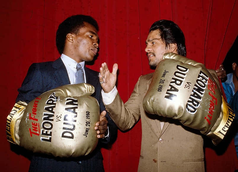 Ray Leonard With Comically Large Boxing Glove Wallpaper