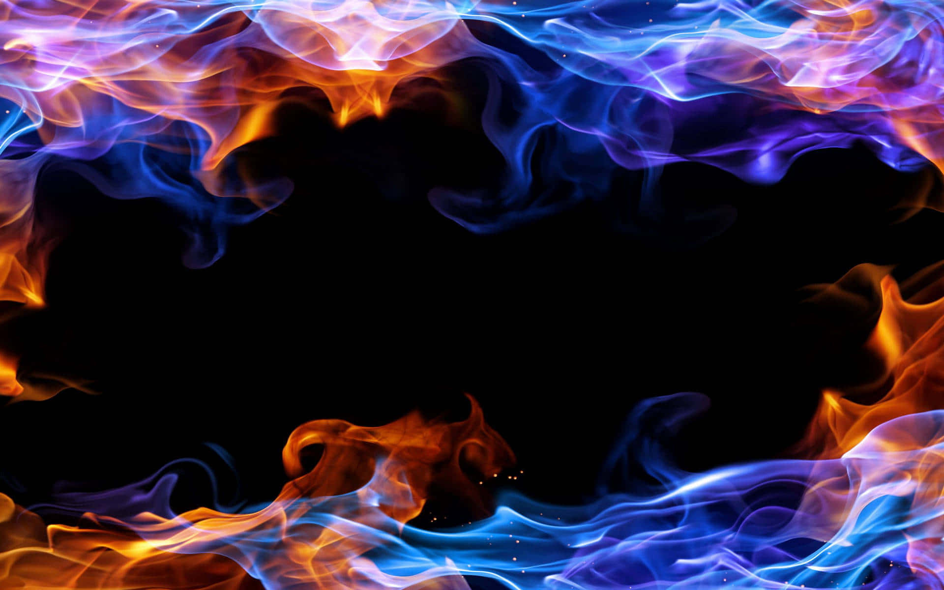 Red And Blue Flames Ignite An Atmosphere Of Excitement And Adventure Wallpaper