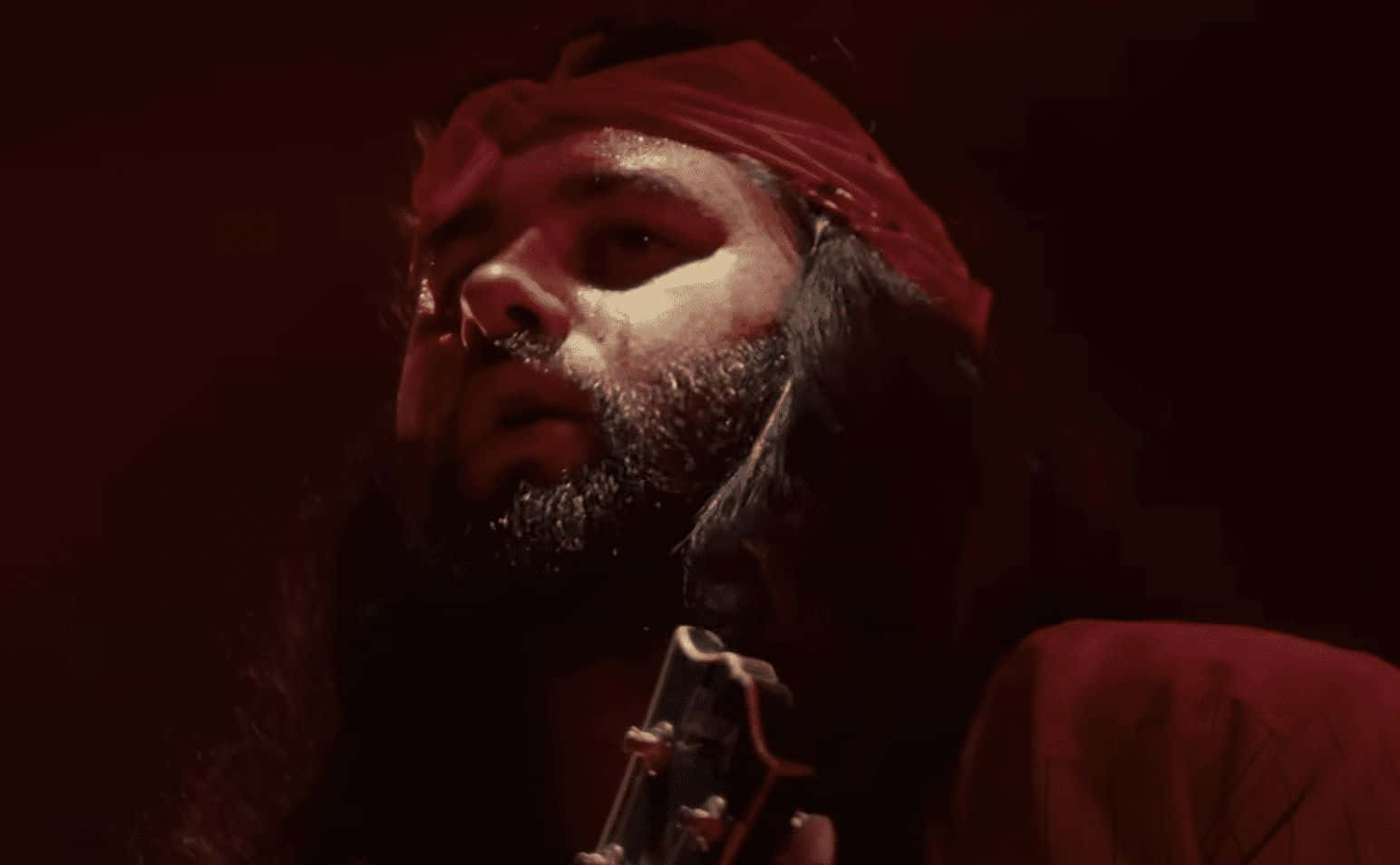 Red Bandana Musician Performance Wallpaper