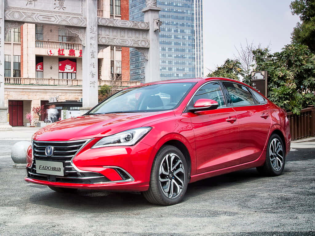 Red Changan Eado Sedan Urban Backdrop Wallpaper