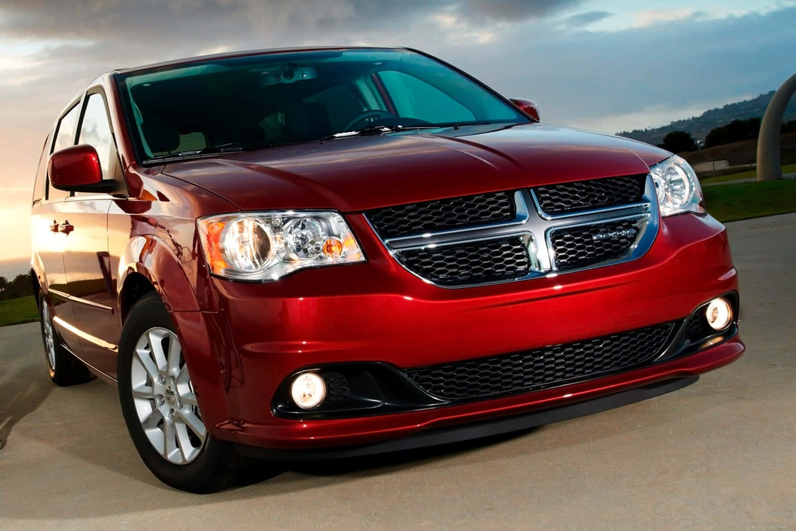 Red Dodge Grand Caravanat Dusk Wallpaper