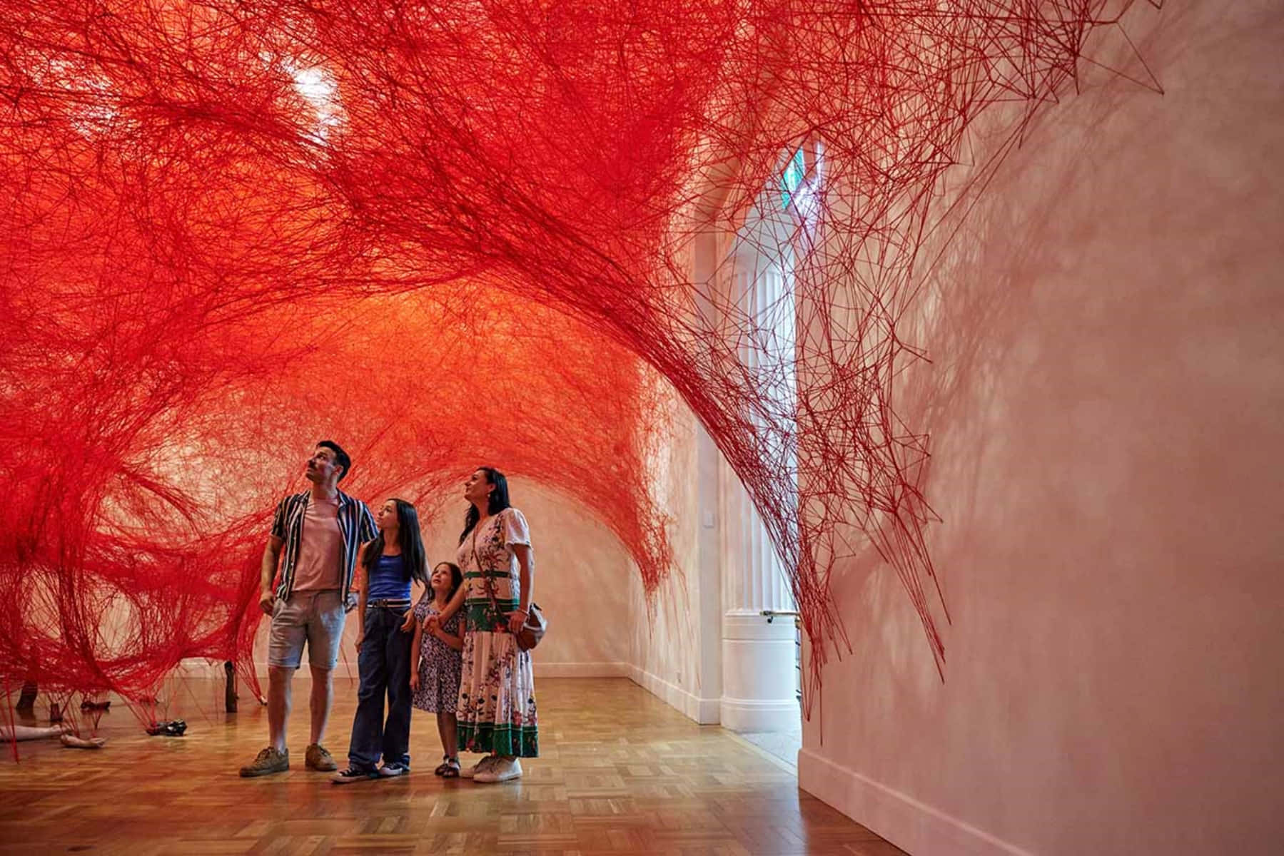 Red Fiber Art Installation Visitors Wallpaper