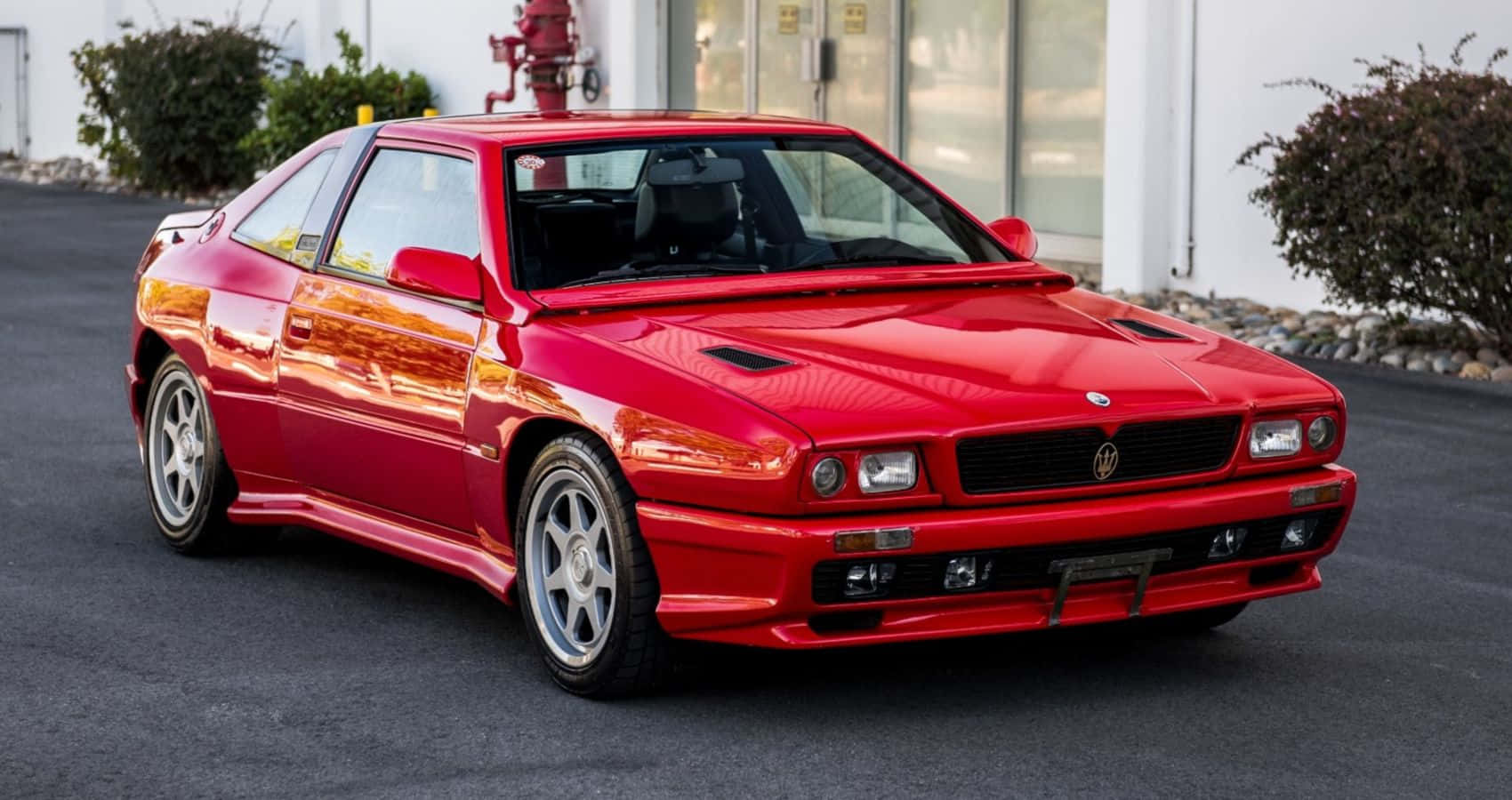 Red Maserati Shamal Luxury Sports Car Wallpaper