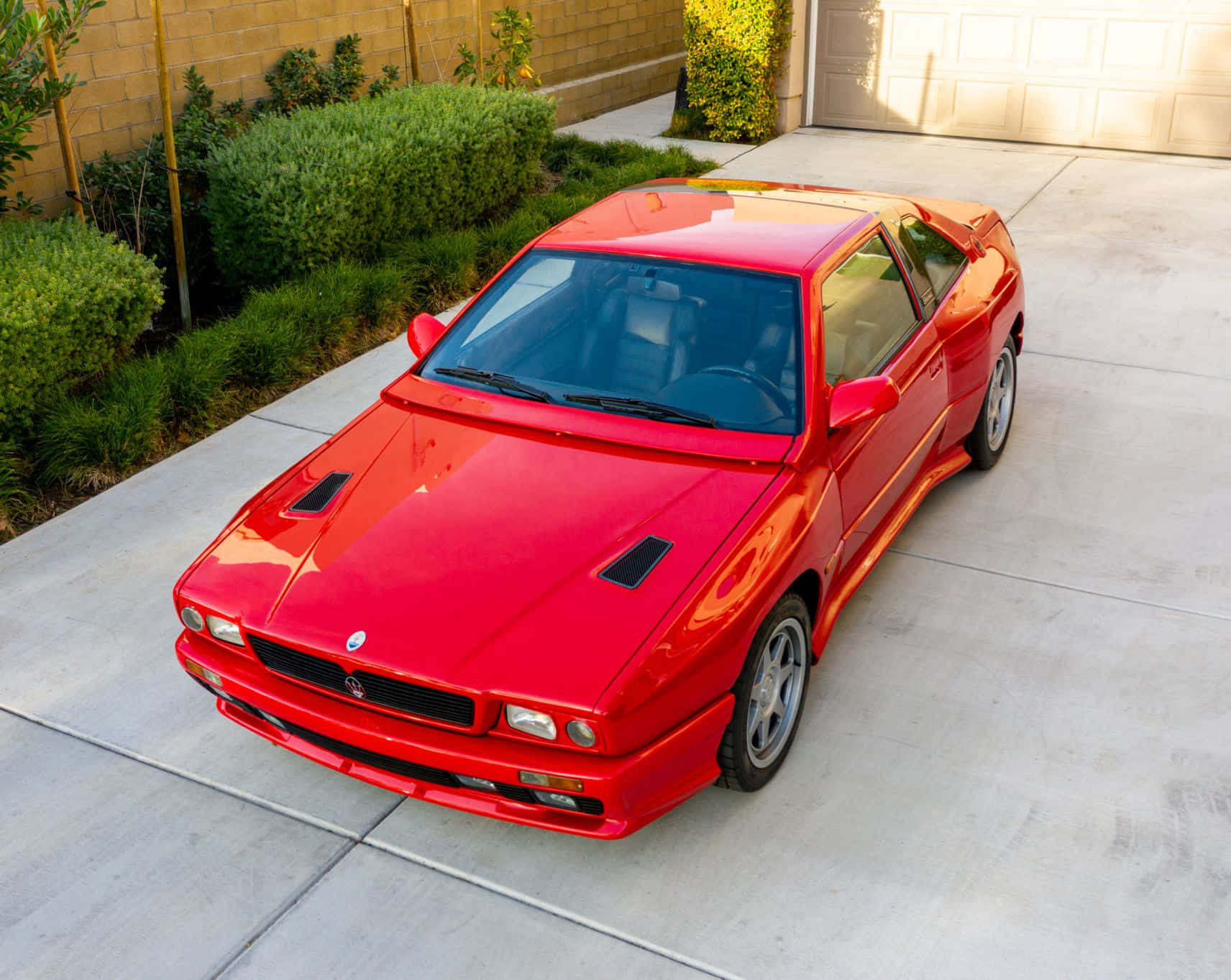 Red Maserati Shamal Luxury Sports Car Wallpaper