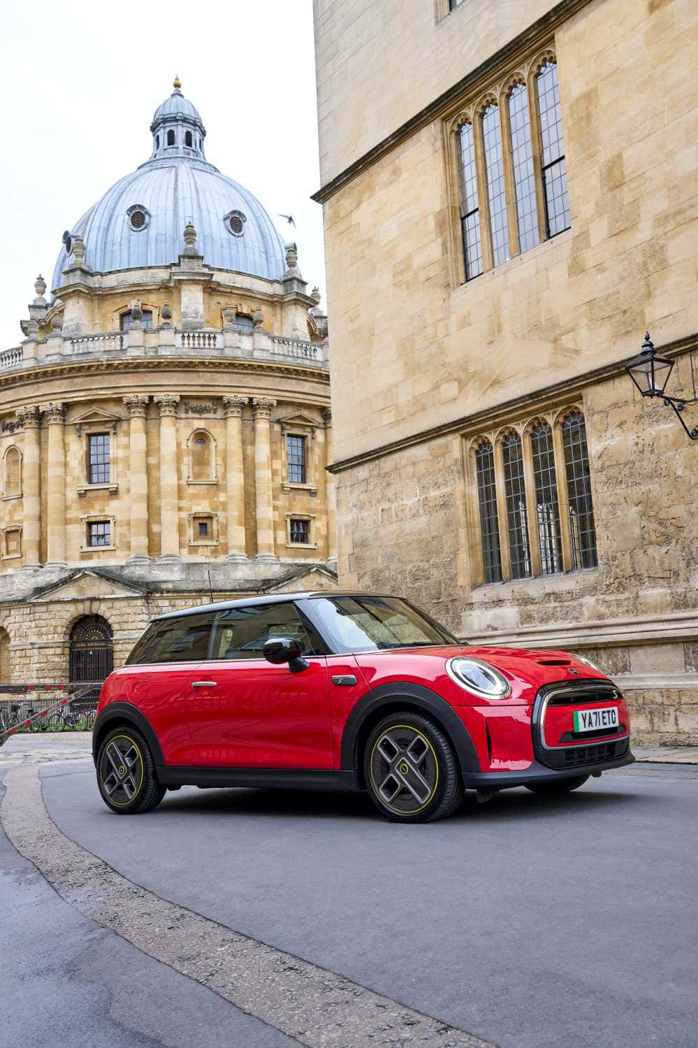 Red Mini Cooper S E Historic Building Backdrop Wallpaper