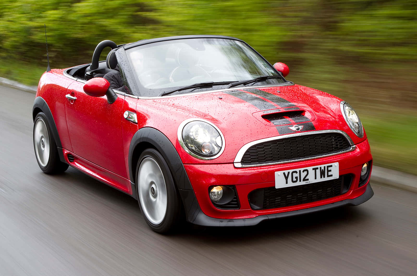 Red Mini Roadster Speeding Wallpaper