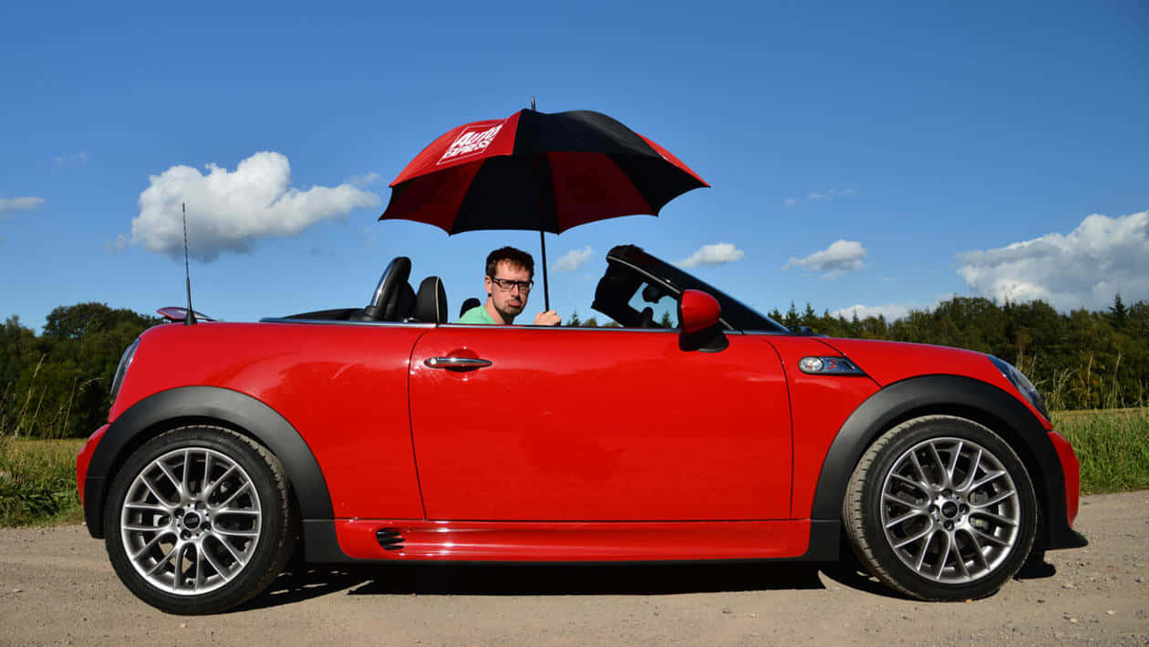 Red Mini Roadster With Umbrella Wallpaper