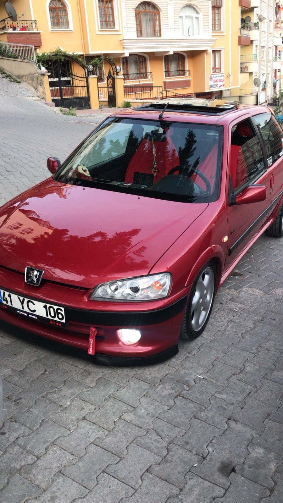 Red Peugeot106 Parked Street Wallpaper