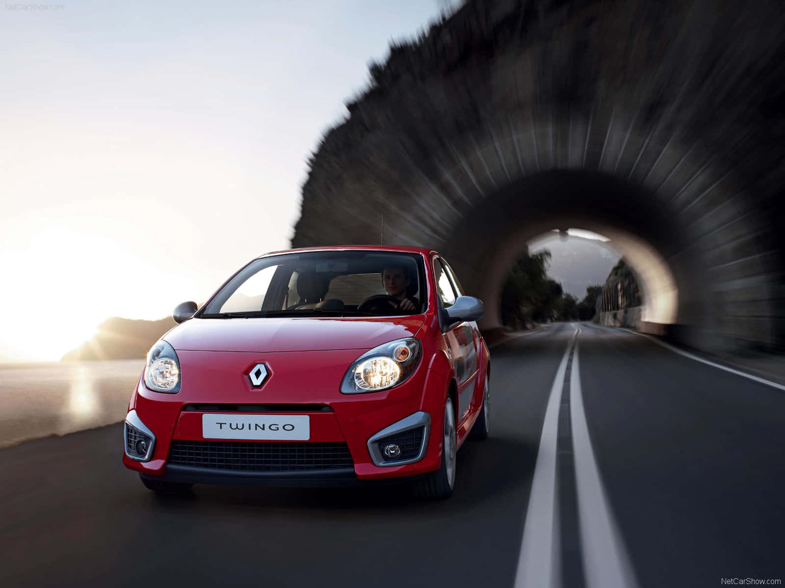 Red Renault Twingo Driving Tunnel Wallpaper