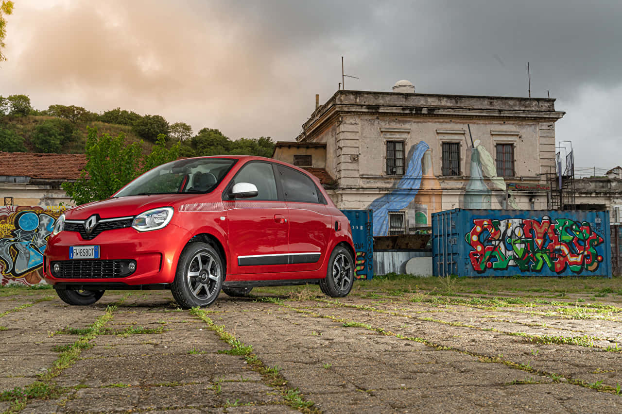 Red Renault Twingo Urban Backdrop.jpg Wallpaper