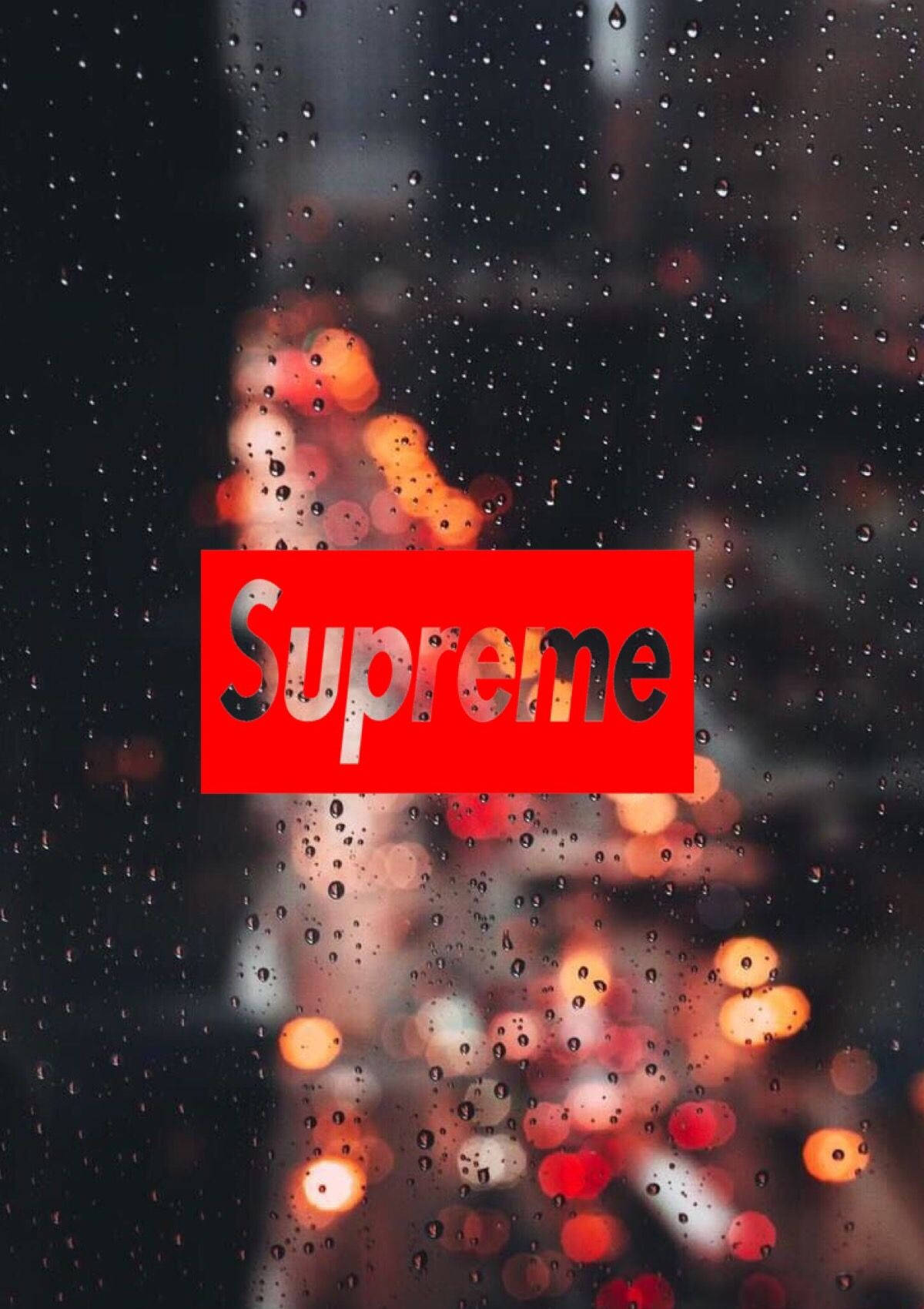 Red Supreme Logo On Rainy Window Wallpaper