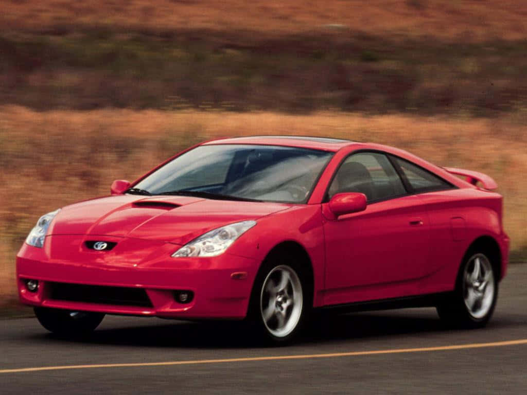 Red Toyota Celica Action Shot Wallpaper