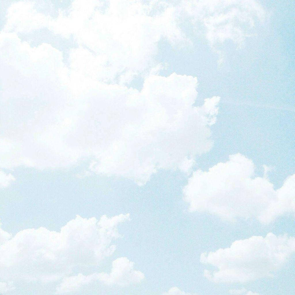 Relaxing Under The Aesthetic Clouds Wallpaper