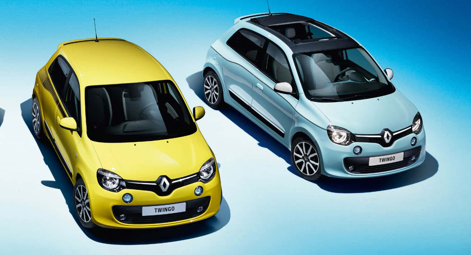 Renault Twingo Yellowand Blue Models Wallpaper