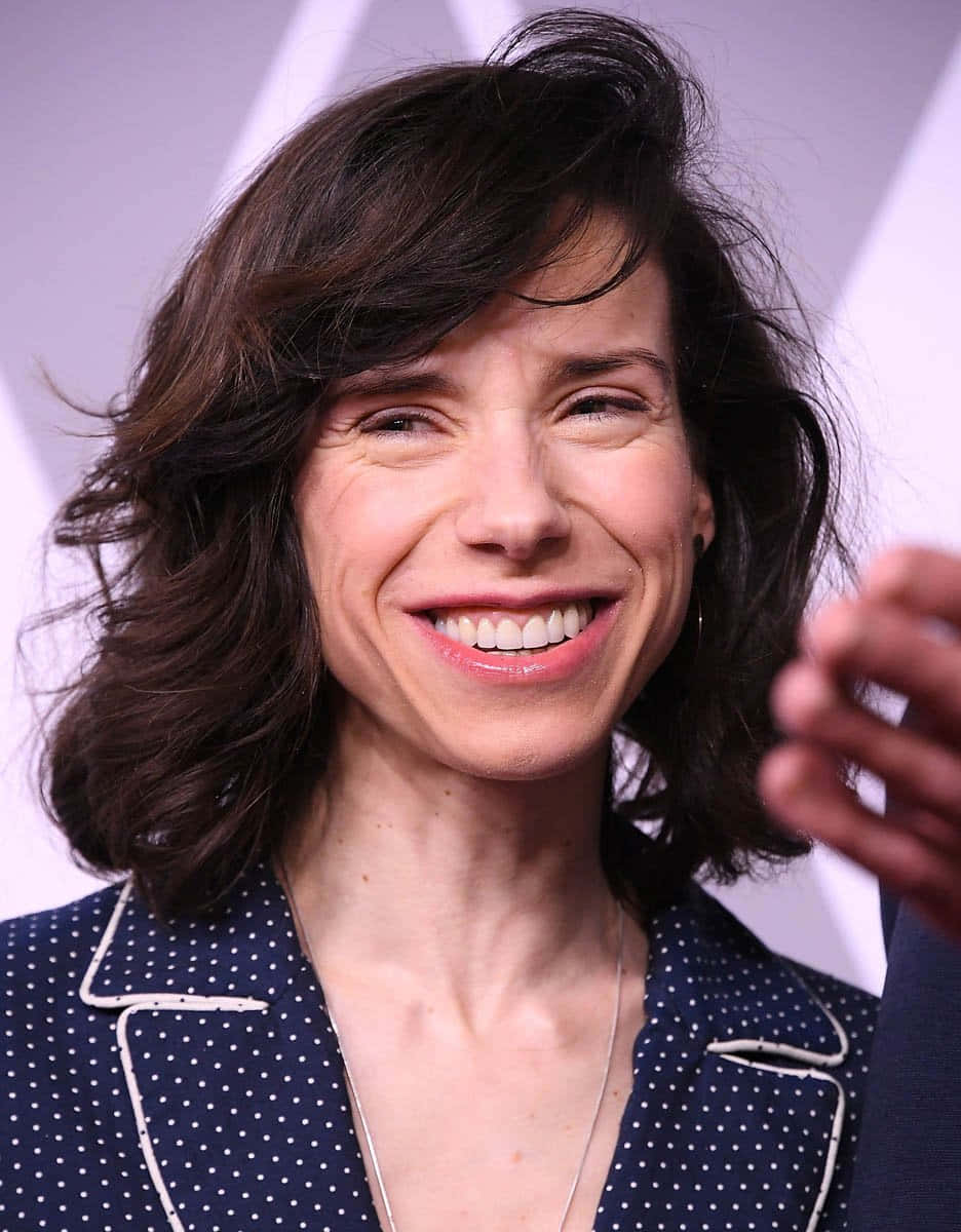 Renowned British Actress Sally Hawkins Giving A Speech At The Podium Wallpaper