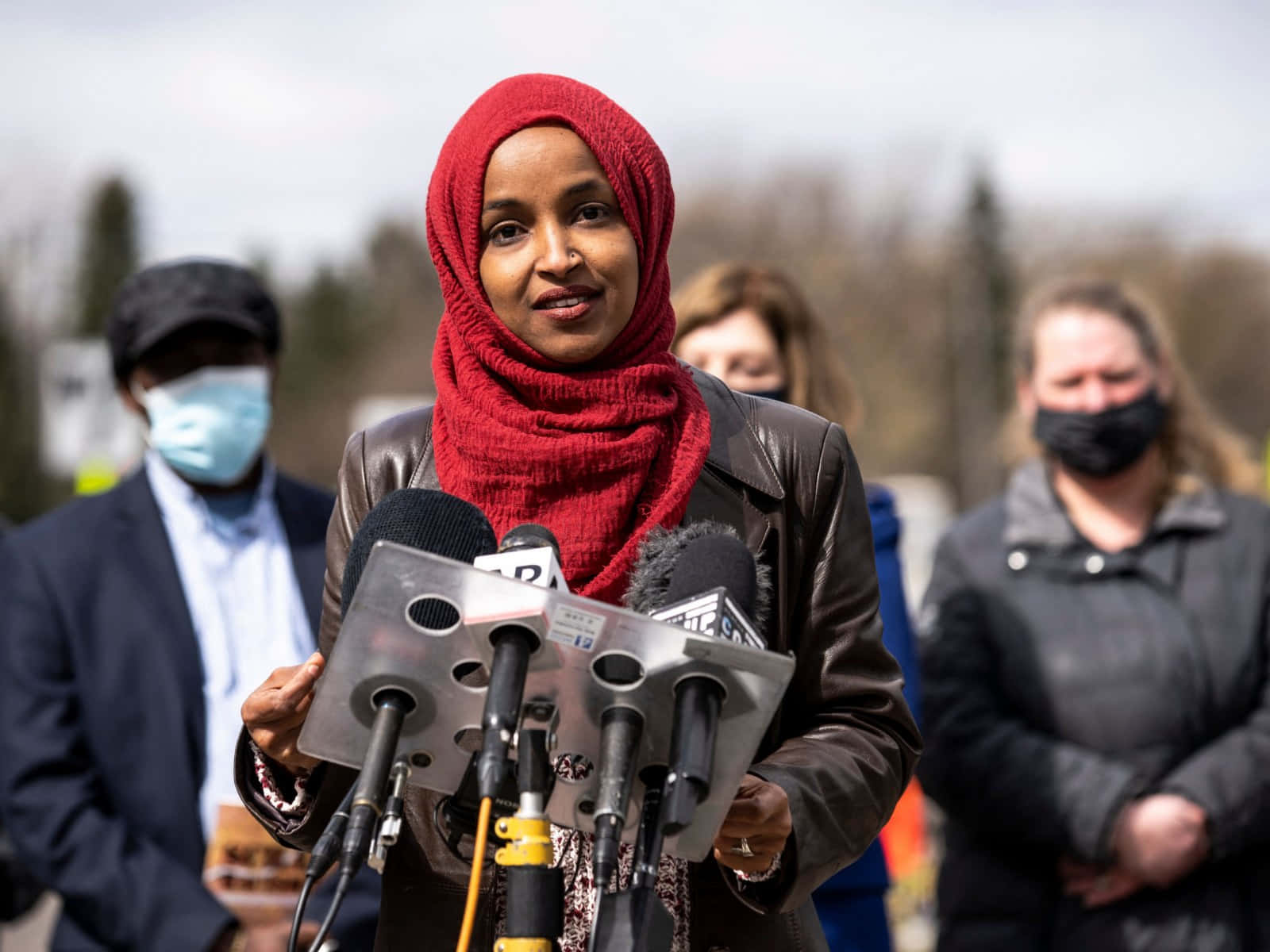 Representative Ilhan Omar In A Vibrant Red Hijab Wallpaper