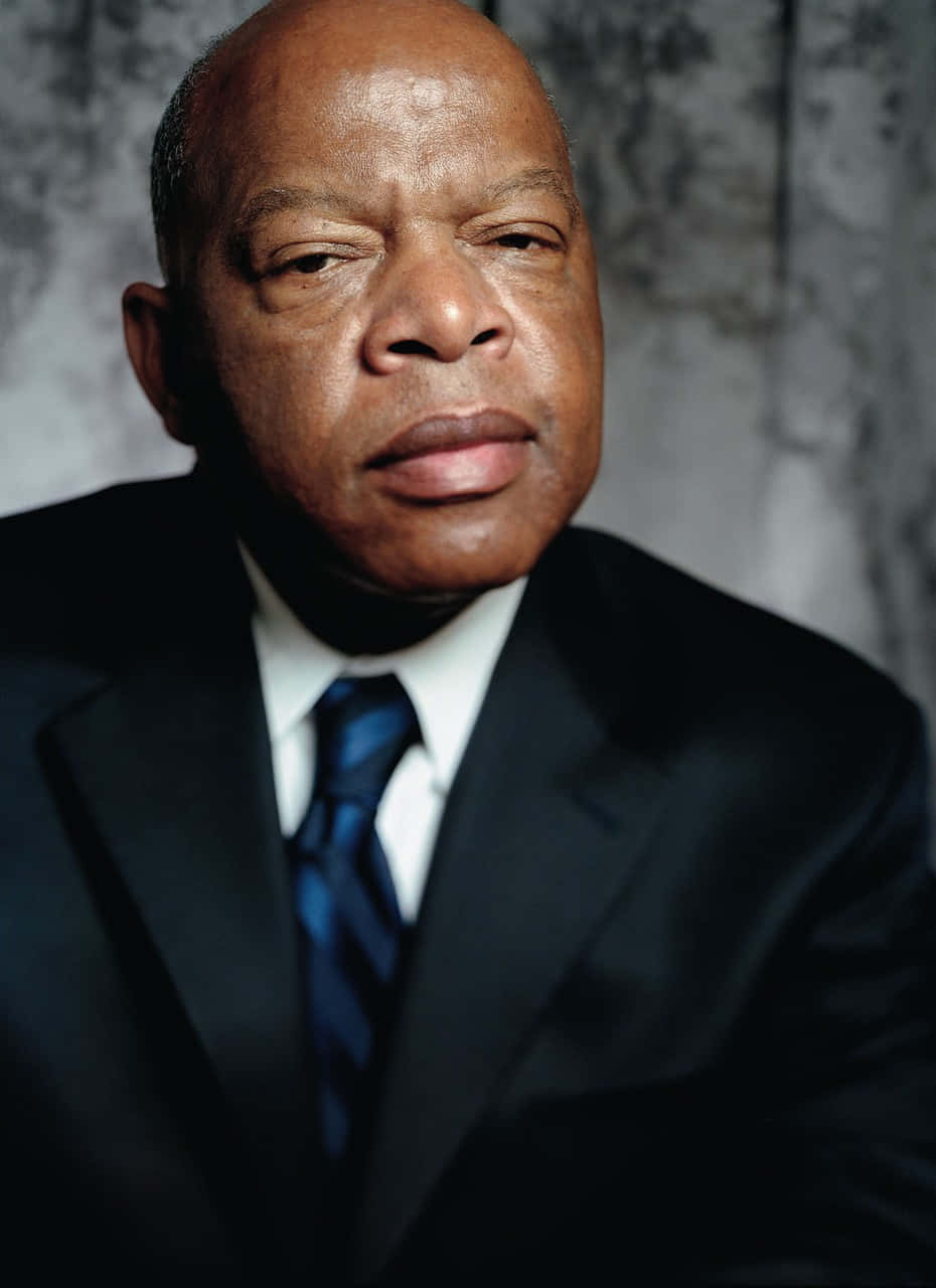 Revered Activist, John Lewis, Against A Gray Background Wallpaper